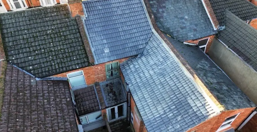 Aerial view of finished slate roofs on terraced rear outriggers